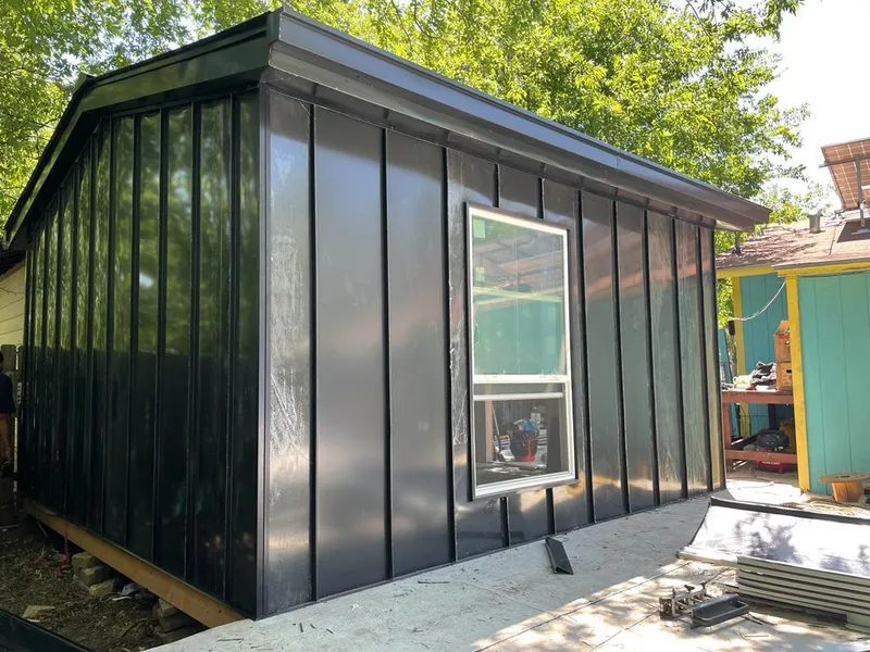 Black standing seam metal wall panels for Roof Inspection in Kissimmee